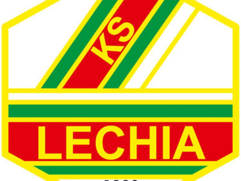Logo klubu Lecja w kolorystyce żółto-czerwono-zielonej na białym tle. Czarny napis 1923